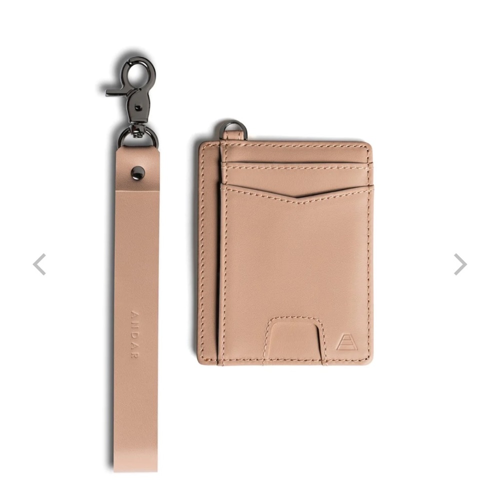 THE DENNER ANDAR WALLET IN BLUSH WITH GUNMETAL HARDWARE. Sold out online